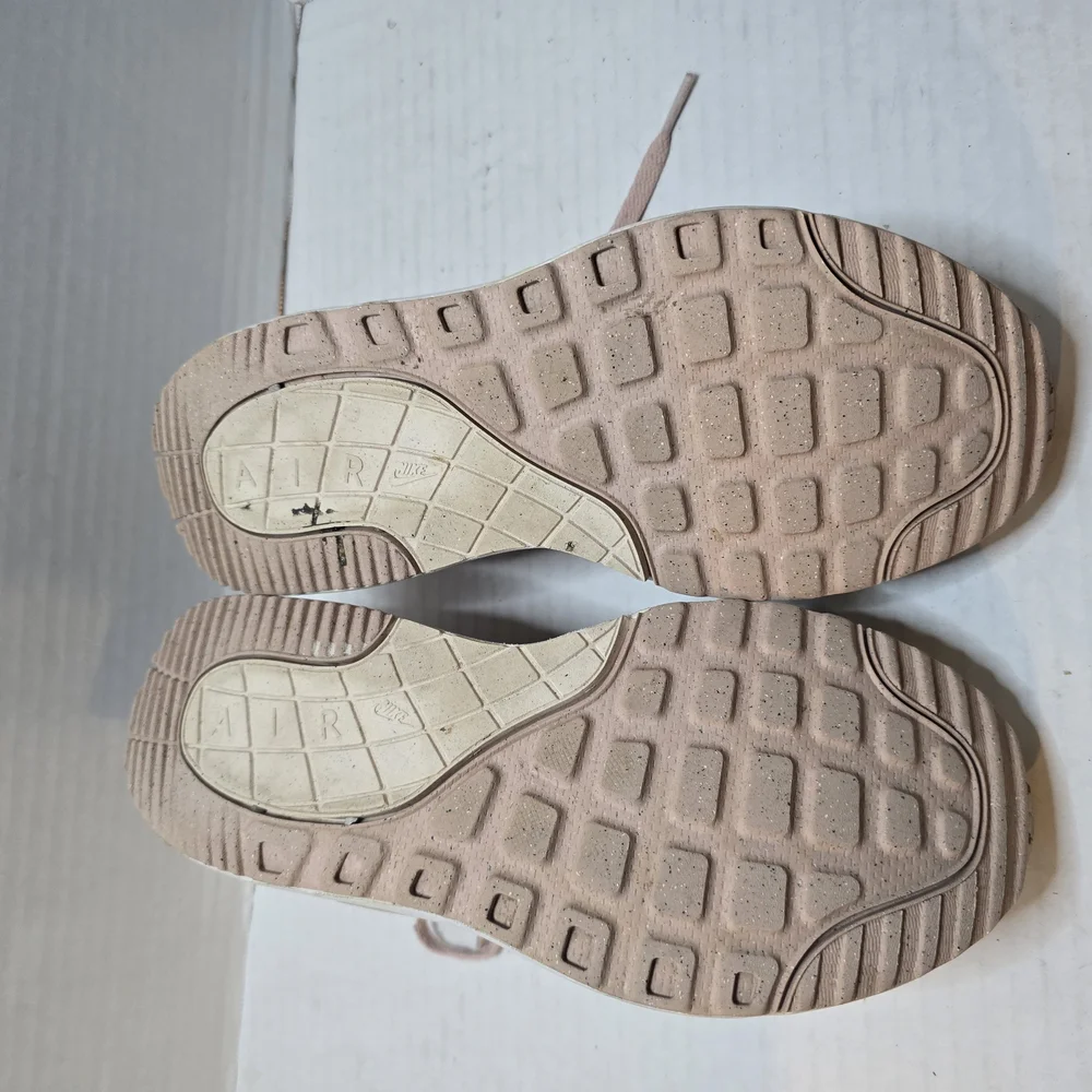 Nike Pink and Cream Suede Sneakers with Lace-Up‎ Design
